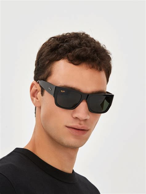 Nomad Sunglasses in Black and G.